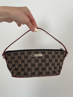 Authentic Gucci Brown GG Canvas Pouch with Red Trim